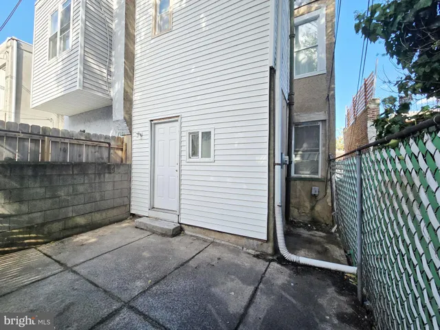 a view of a door and a window