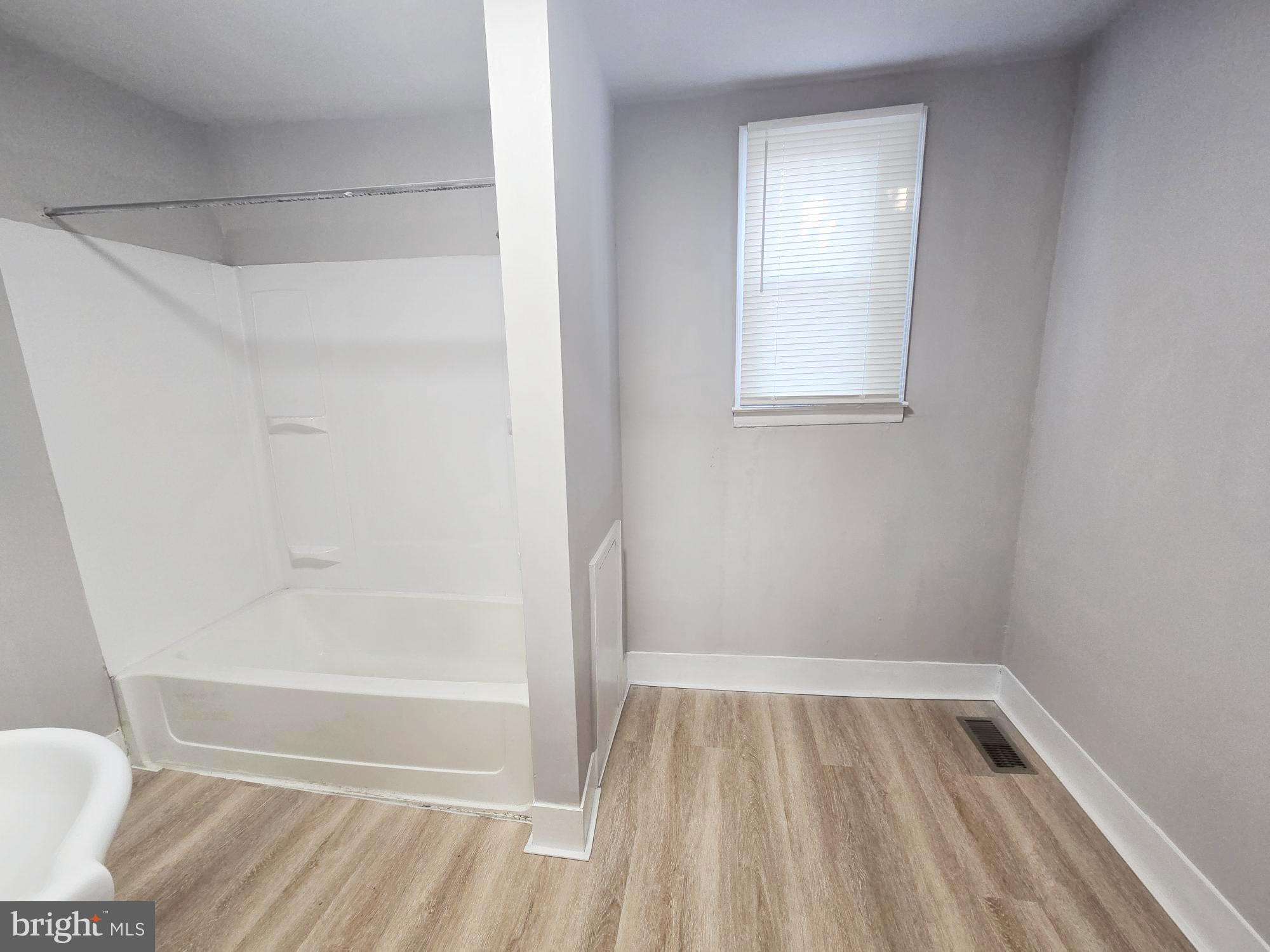 1910 Sigel Street Philadelphia, PA 19145 - Photo 19 of 25 a bathroom with a bathtub
