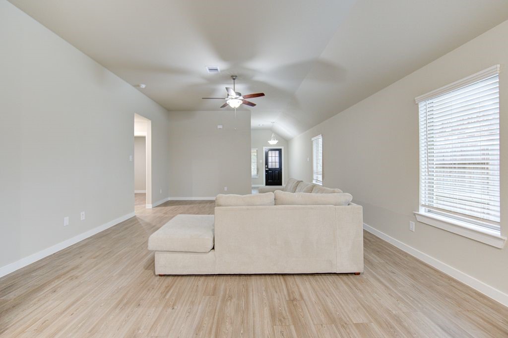 17692 Tree Of Heaven Conroe, TX 77385 - Photo 12 of 50 View of the living room from the dinning room.
