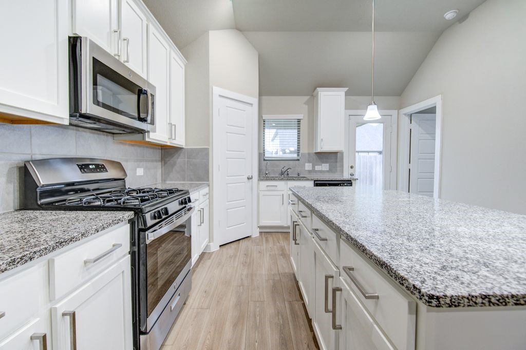 17692 Tree Of Heaven Conroe, TX 77385 - Photo 16 of 50 Spacious cabinets and stainless steel appliances.