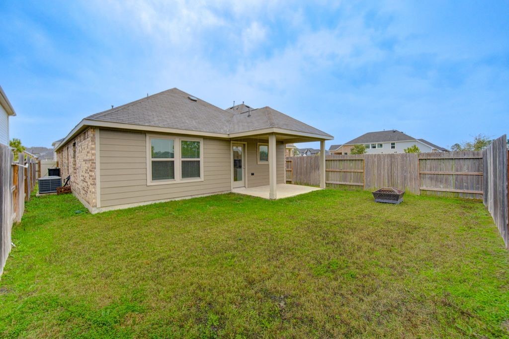 17692 Tree Of Heaven Conroe, TX 77385 - Photo 36 of 50 Large backyard with covered patio