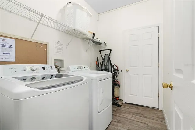 a room with furniture and pool table