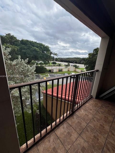 2103 Renaissance Boulevard, Unit 307 Miramar, FL 33025 - Photo 16 of 25 a balcony with street view