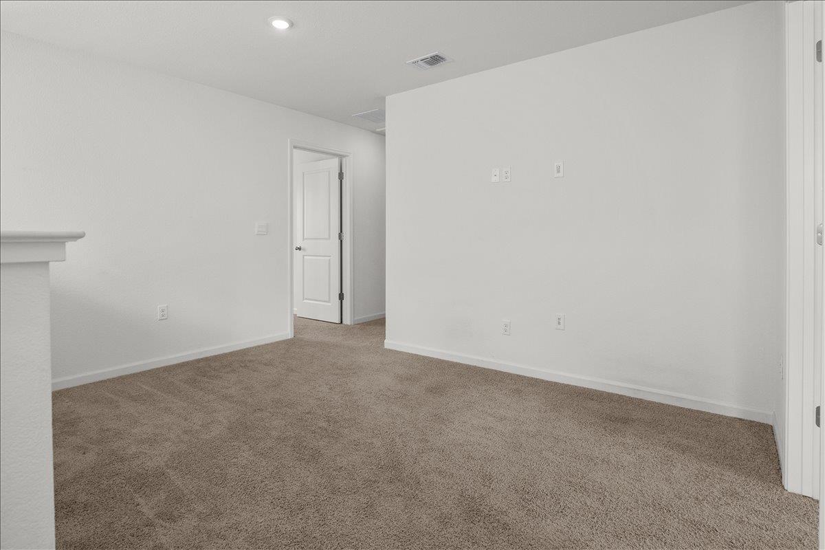 18462 Waterfront Way Lathrop, CA 95330 - Photo 19 of 50 a view of an empty room