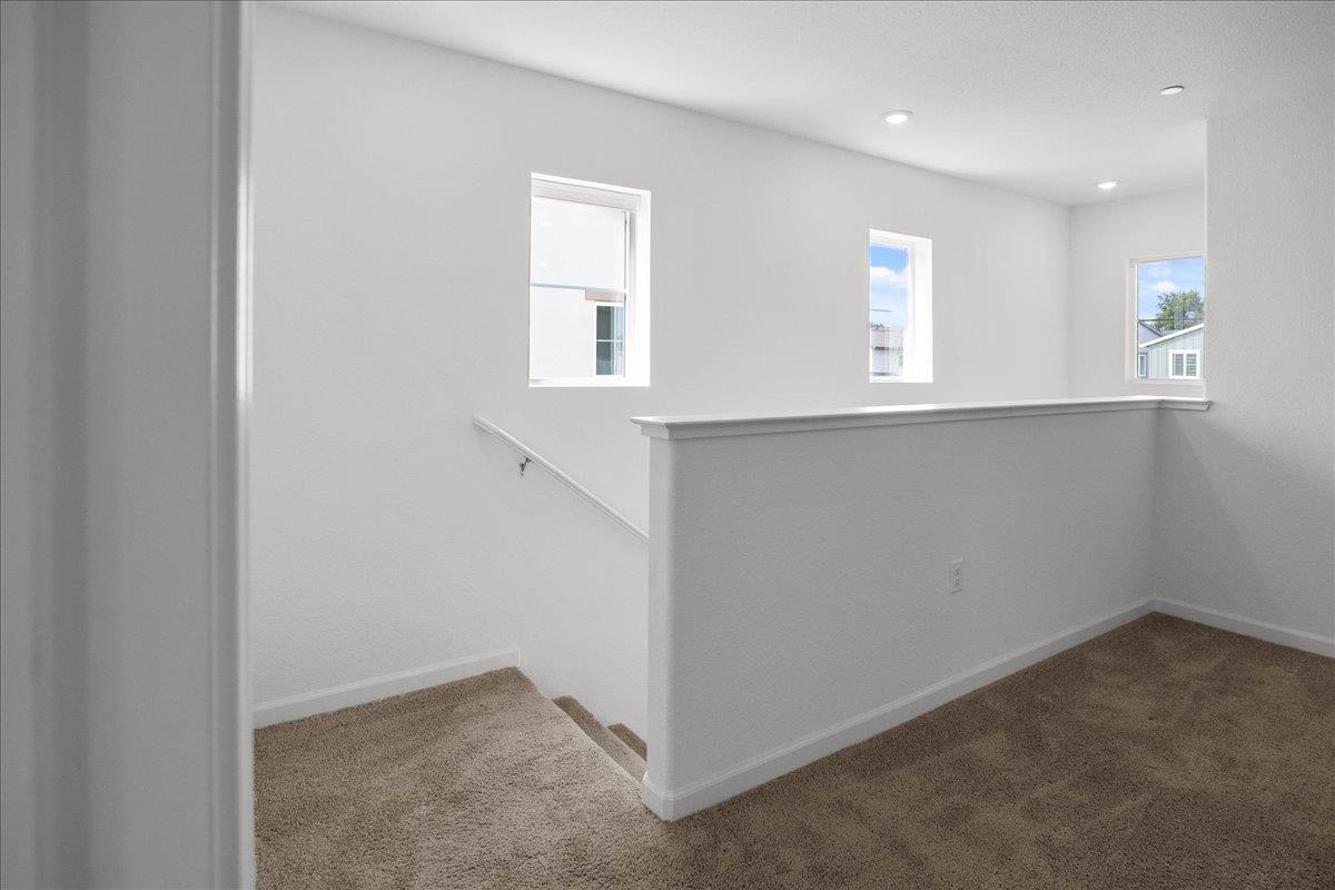 18462 Waterfront Way Lathrop, CA 95330 - Photo 21 of 50 an empty room with windows