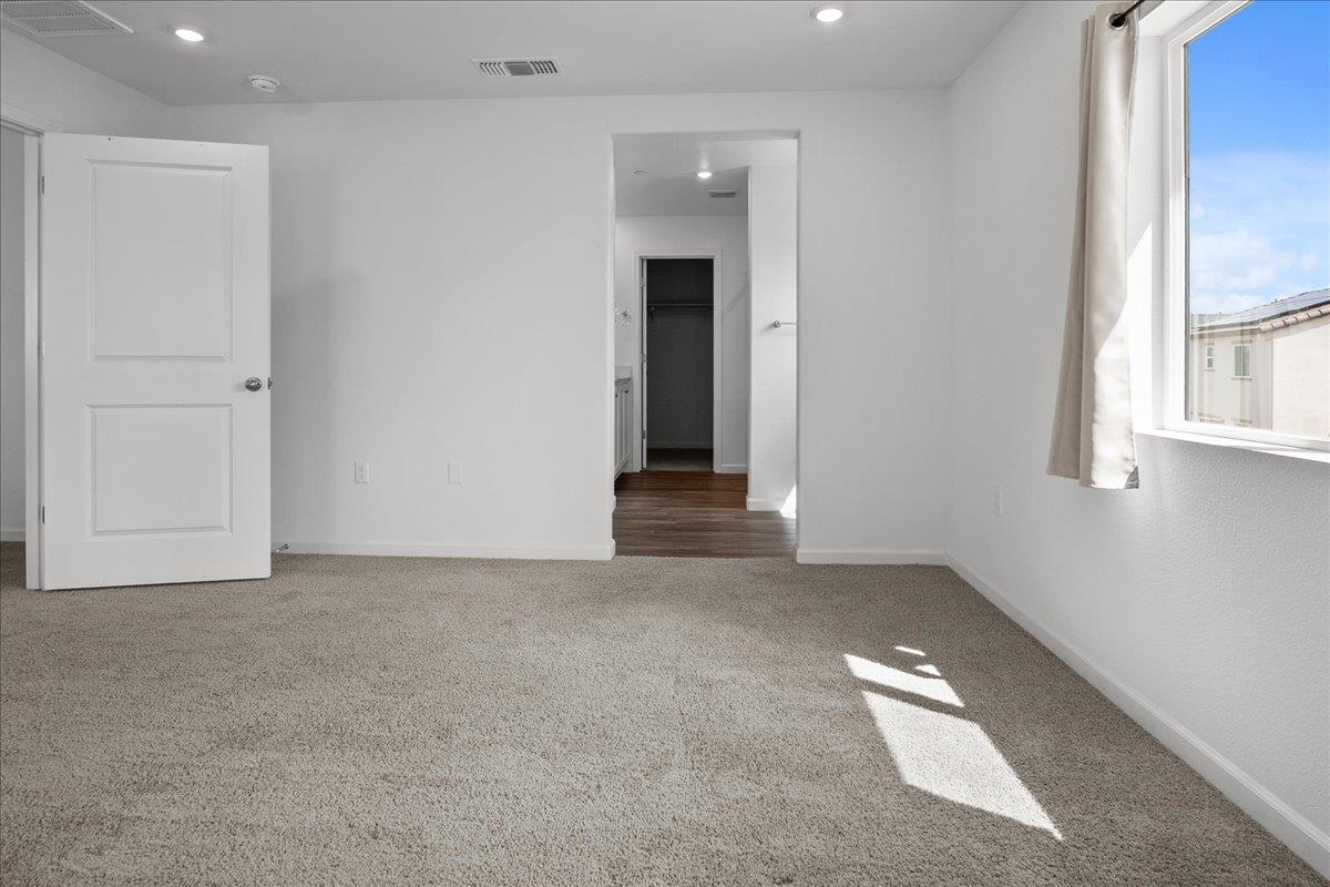 18462 Waterfront Way Lathrop, CA 95330 - Photo 26 of 50 an empty room with windows