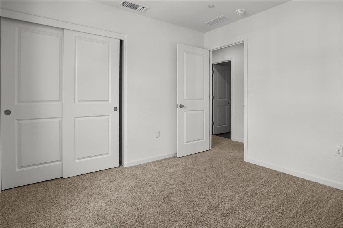 18462 Waterfront Way Lathrop, CA 95330 - Photo 34 of 50 an empty room with closet