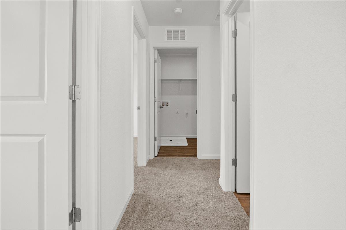 18462 Waterfront Way Lathrop, CA 95330 - Photo 35 of 50 a view of a hallway to closet