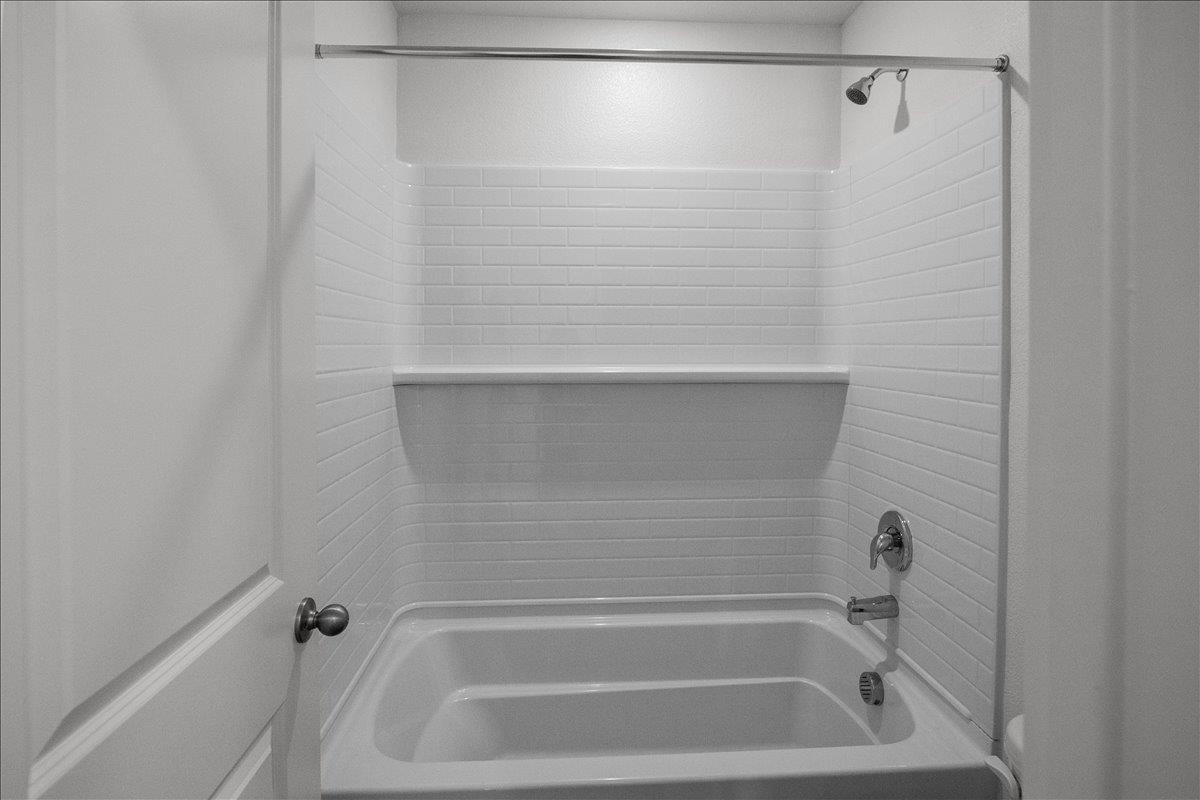 18462 Waterfront Way Lathrop, CA 95330 - Photo 39 of 50 a view of a bathtub in a bathroom