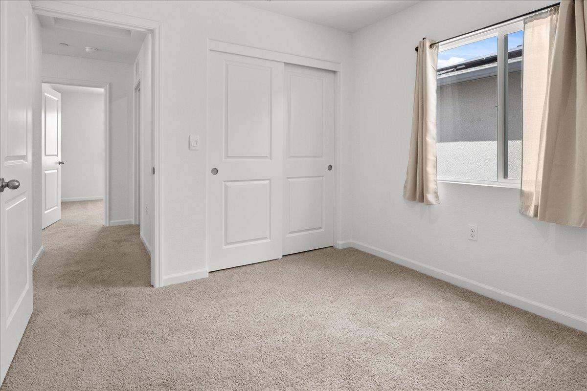 18462 Waterfront Way Lathrop, CA 95330 - Photo 42 of 50 an empty room with closet area