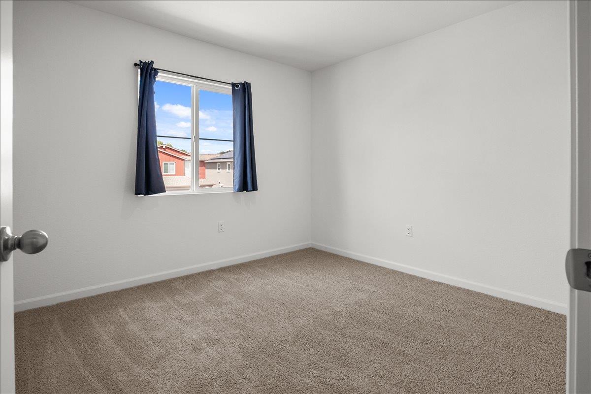 18462 Waterfront Way Lathrop, CA 95330 - Photo 43 of 50 an empty room with windows