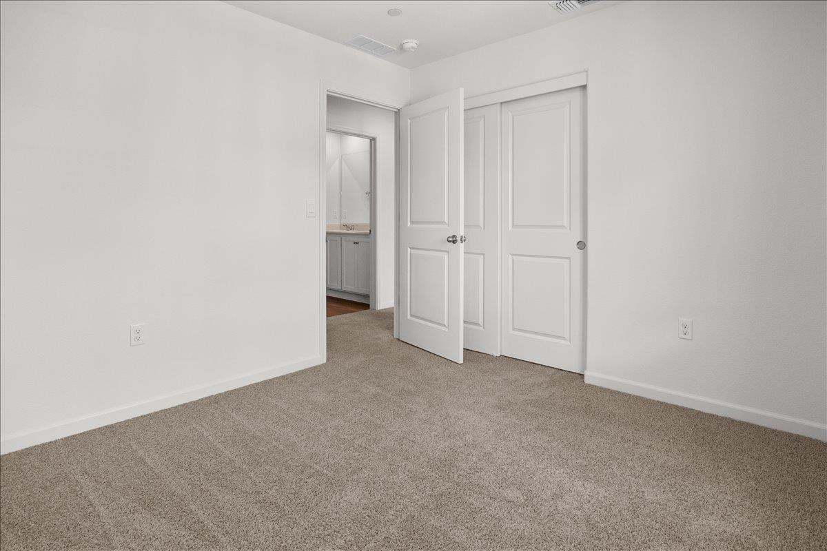 18462 Waterfront Way Lathrop, CA 95330 - Photo 44 of 50 a view of an empty room