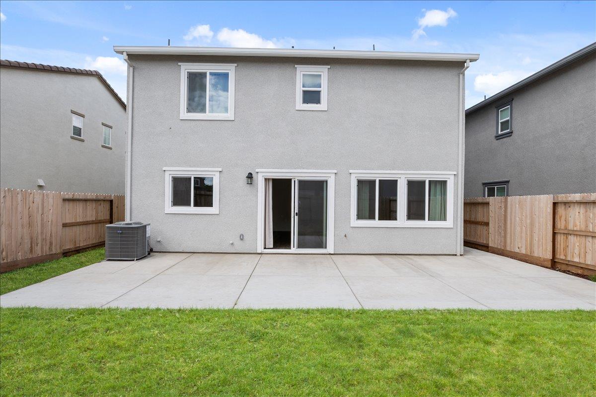 18462 Waterfront Way Lathrop, CA 95330 - Photo 47 of 50 a house view with a garden space
