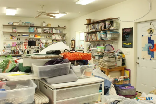 a utility room with multiple dryer and washer
