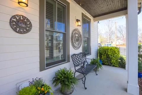 a backyard of a house with seating space