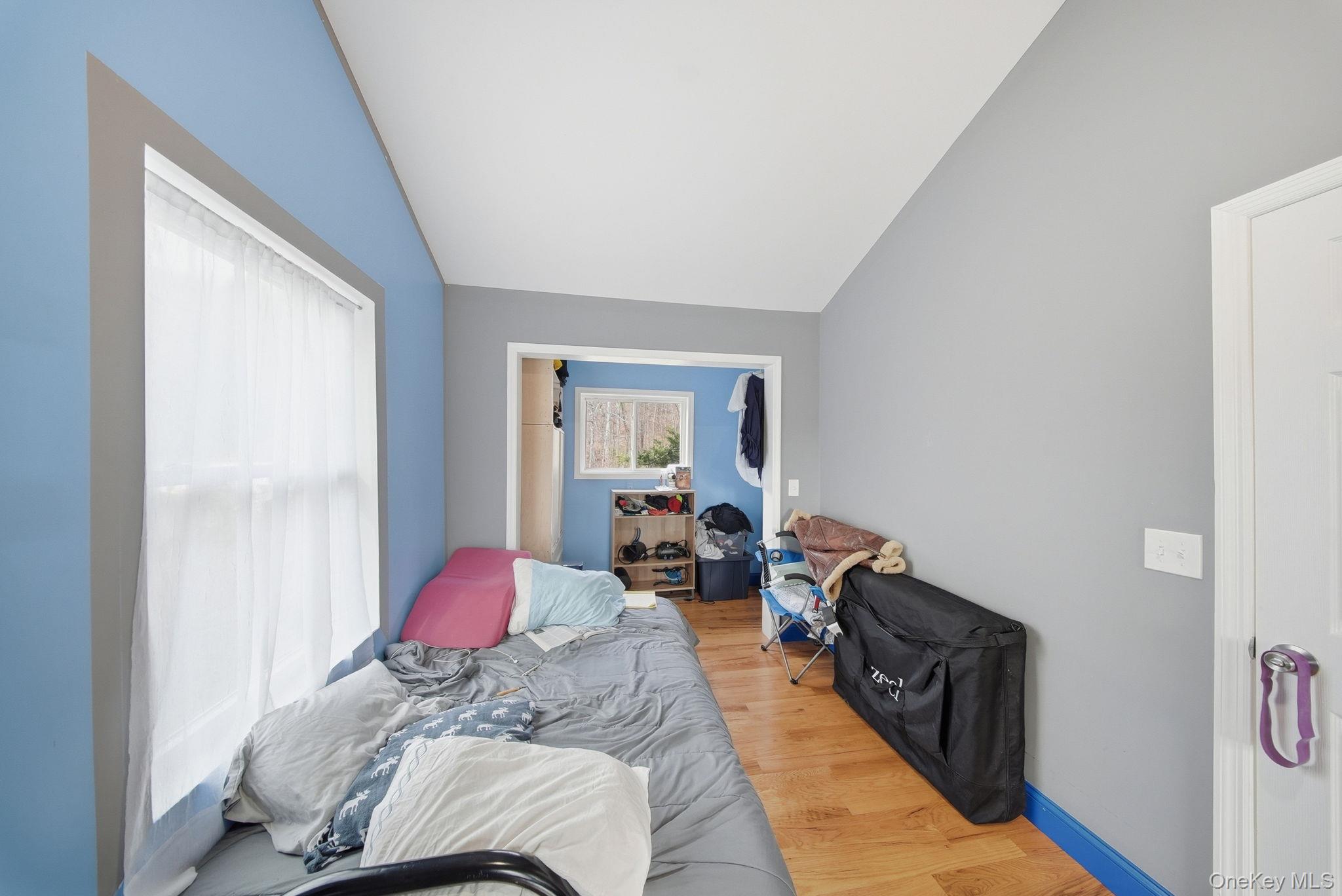 52 Martins Road Huguenot, NY 12746 - Photo 11 of 26 a bedroom with furniture and a window