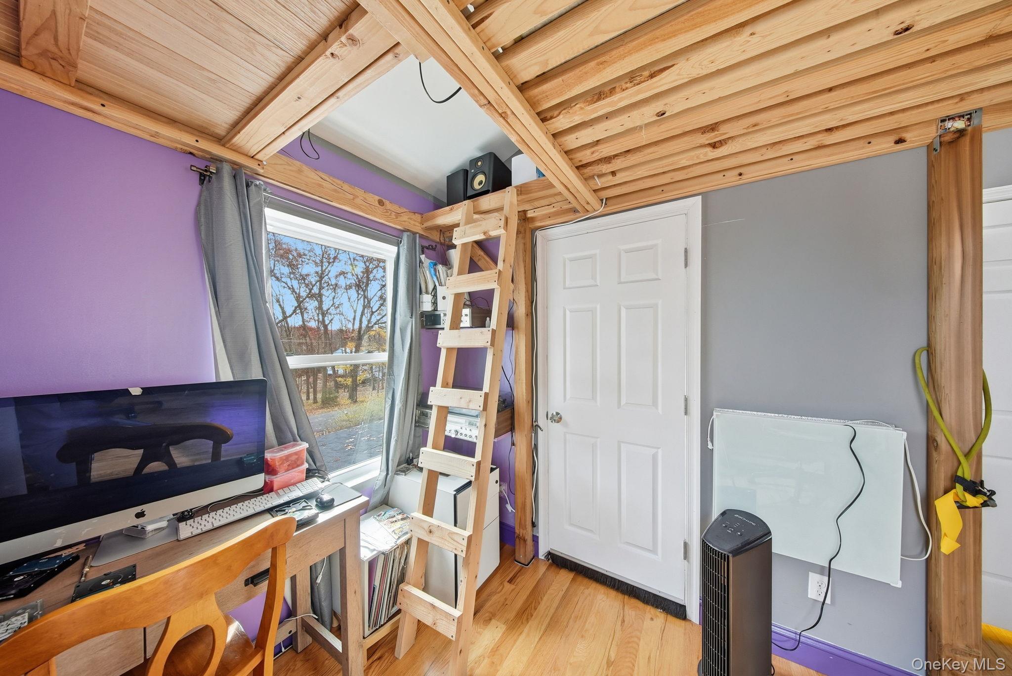 52 Martins Road Huguenot, NY 12746 - Photo 15 of 26 a bed room with a bed and a television