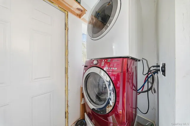 a bathroom with a toilet sink and shower