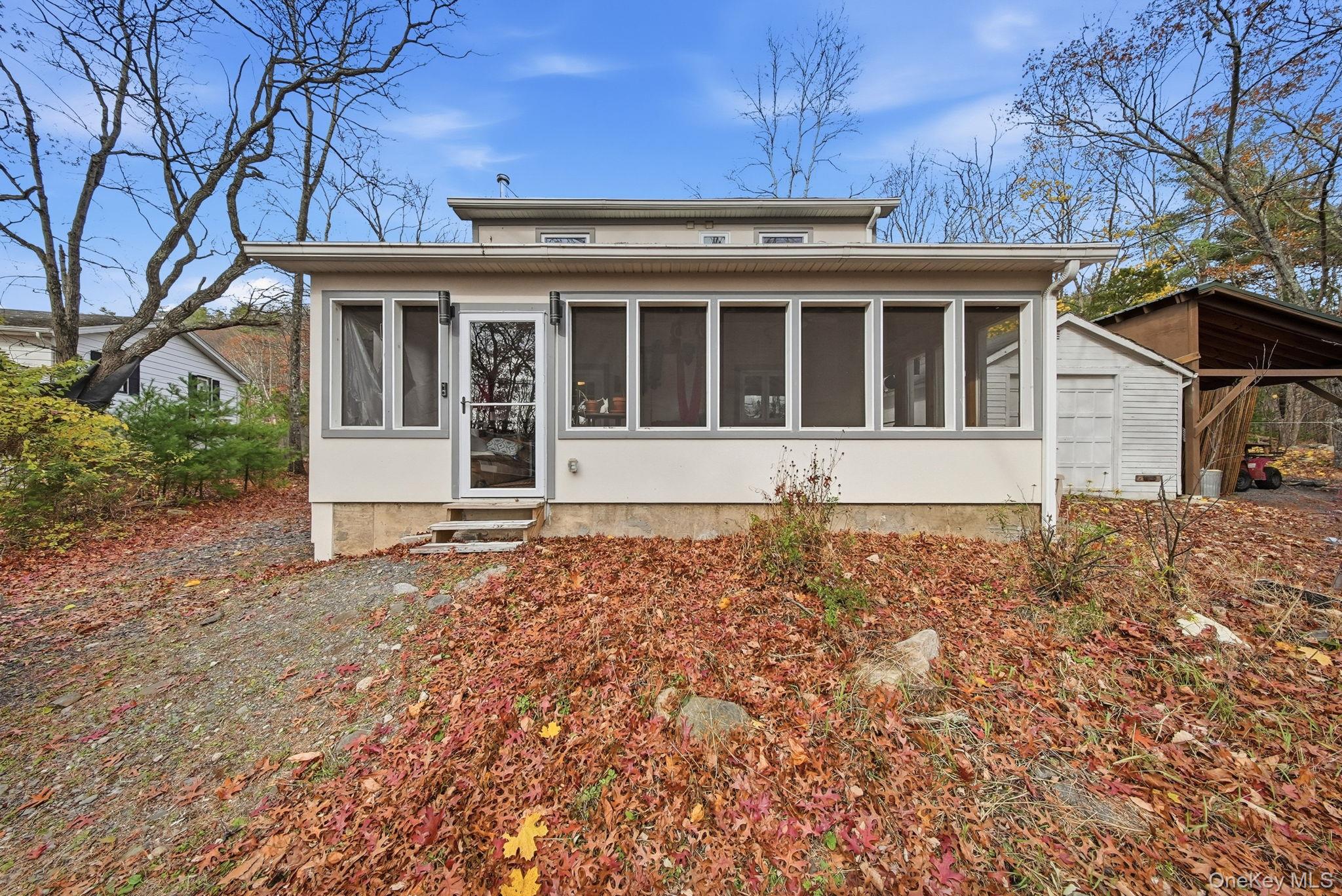 52 Martins Road Huguenot, NY 12746 - Photo 21 of 26 a front view of a house with a yard