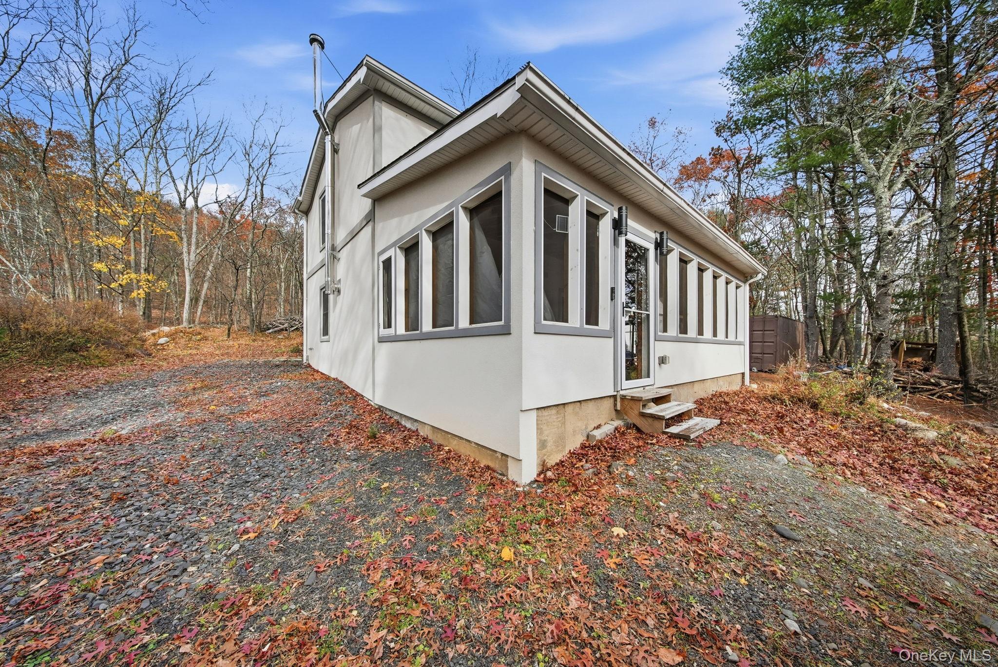 52 Martins Road Huguenot, NY 12746 - Photo 22 of 26 a view of a house with a yard