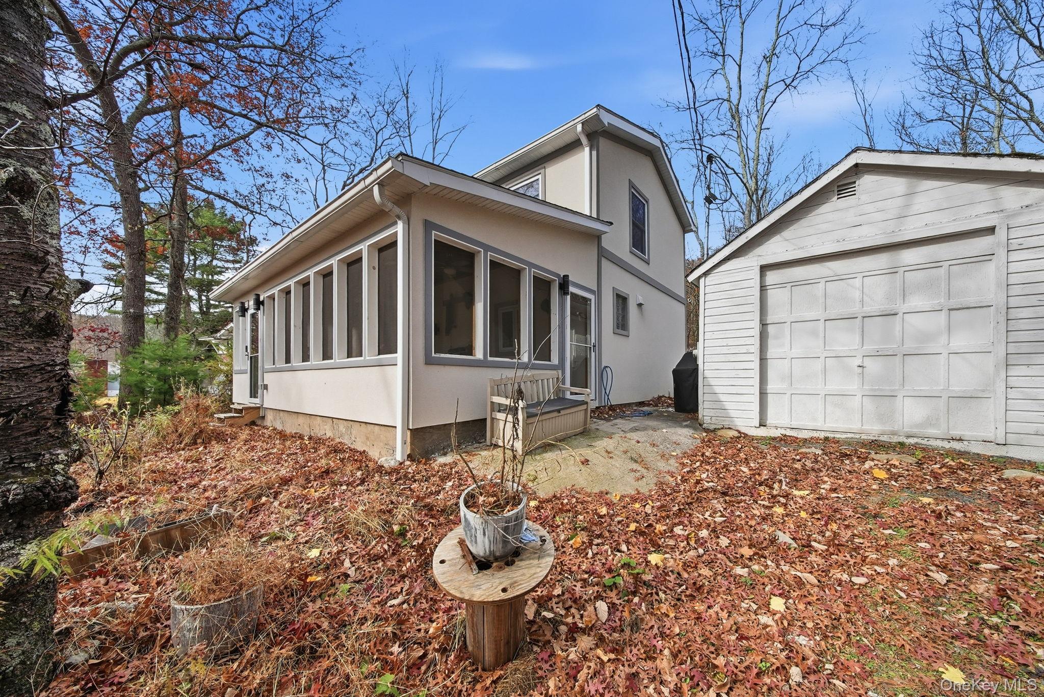 52 Martins Road Huguenot, NY 12746 - Photo 24 of 26 a front view of a house with garden