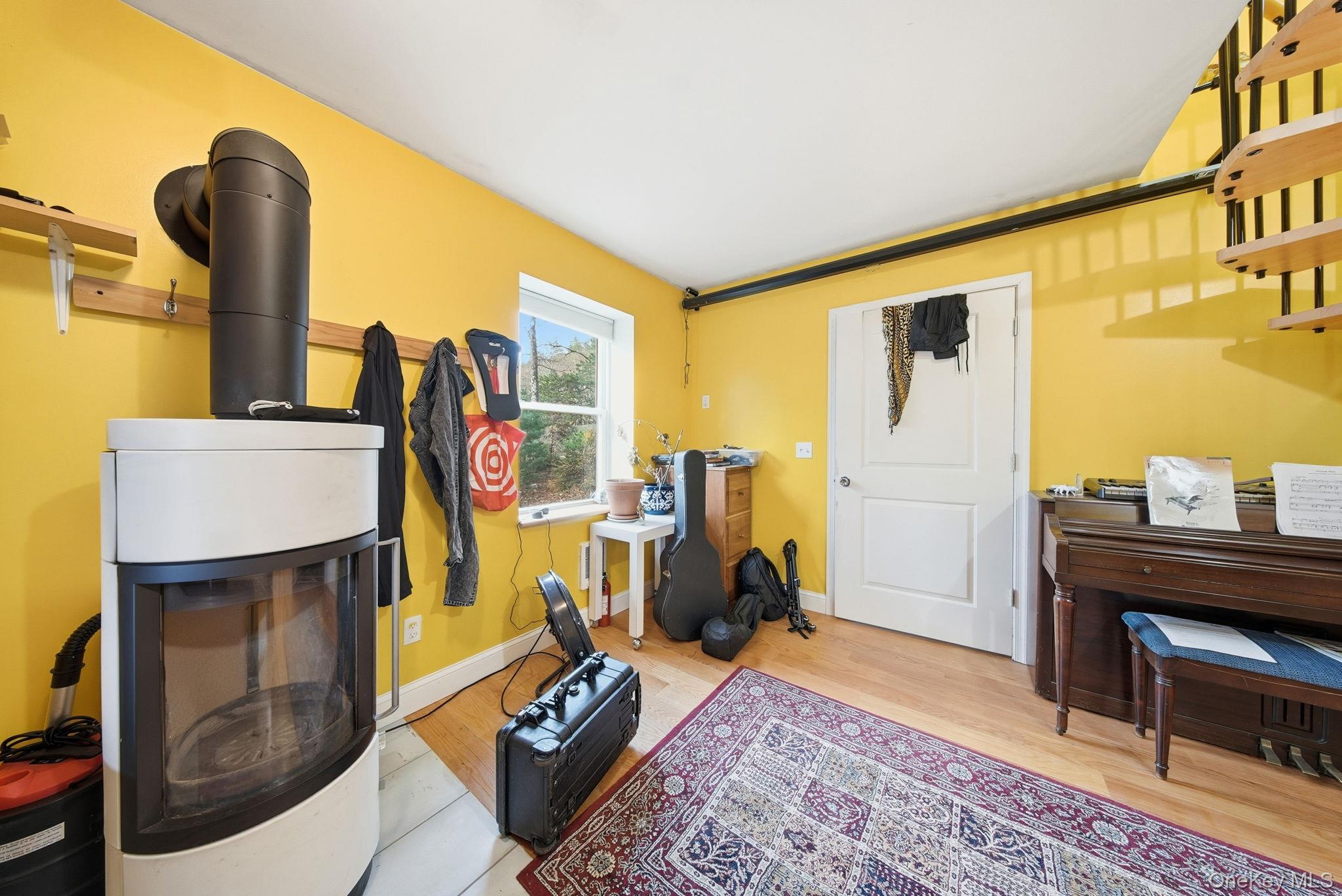 52 Martins Road Huguenot, NY 12746 - Photo 6 of 26 a view of a livingroom with furniture and workspace