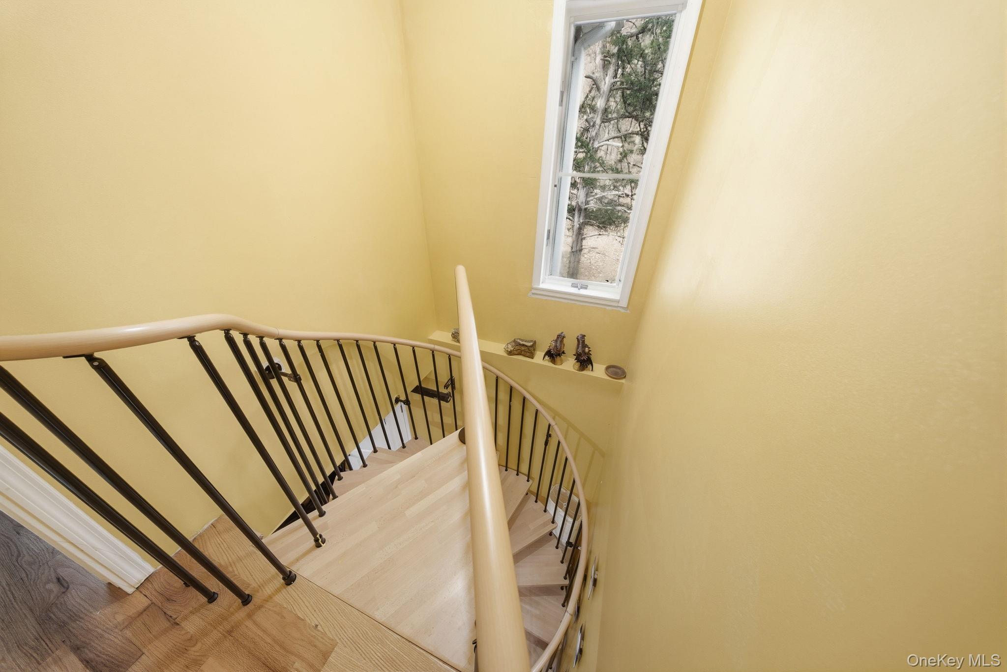 52 Martins Road Huguenot, NY 12746 - Photo 10 of 26 a view of a hallway with wooden floor and a bathroom