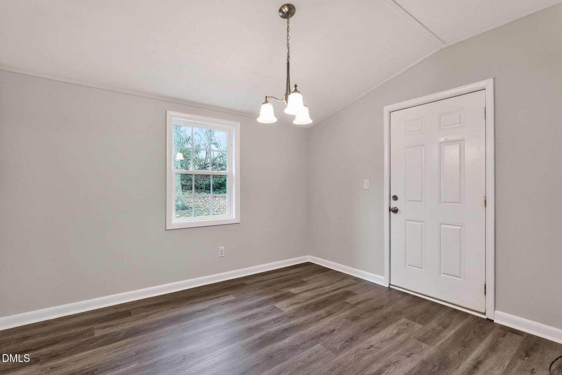 517 Cooper Road Raleigh, NC 27610 - Photo 13 of 29 wooden floor in an empty room with a window