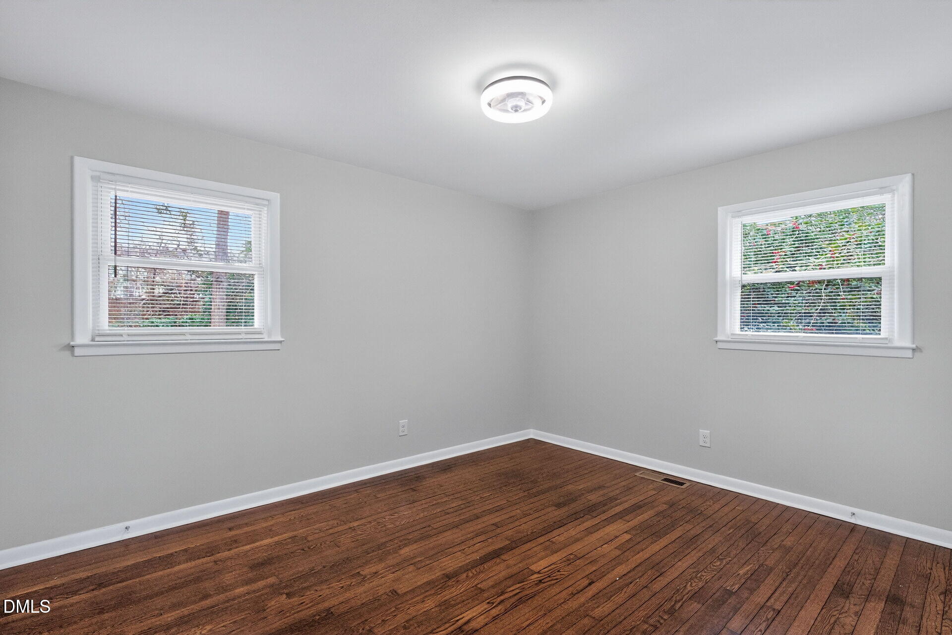 517 Cooper Road Raleigh, NC 27610 - Photo 18 of 29 a view of a room with wooden floor and window