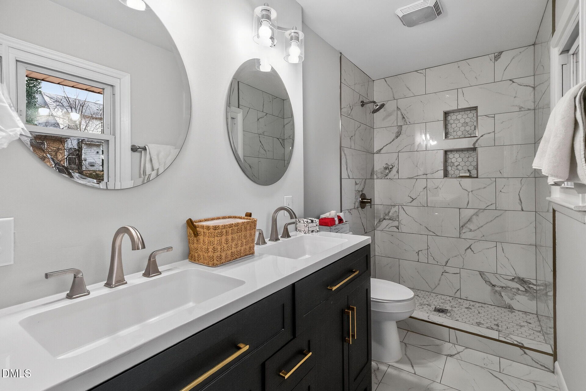 517 Cooper Road Raleigh, NC 27610 - Photo 19 of 29 a bathroom with a sink a toilet and a shower