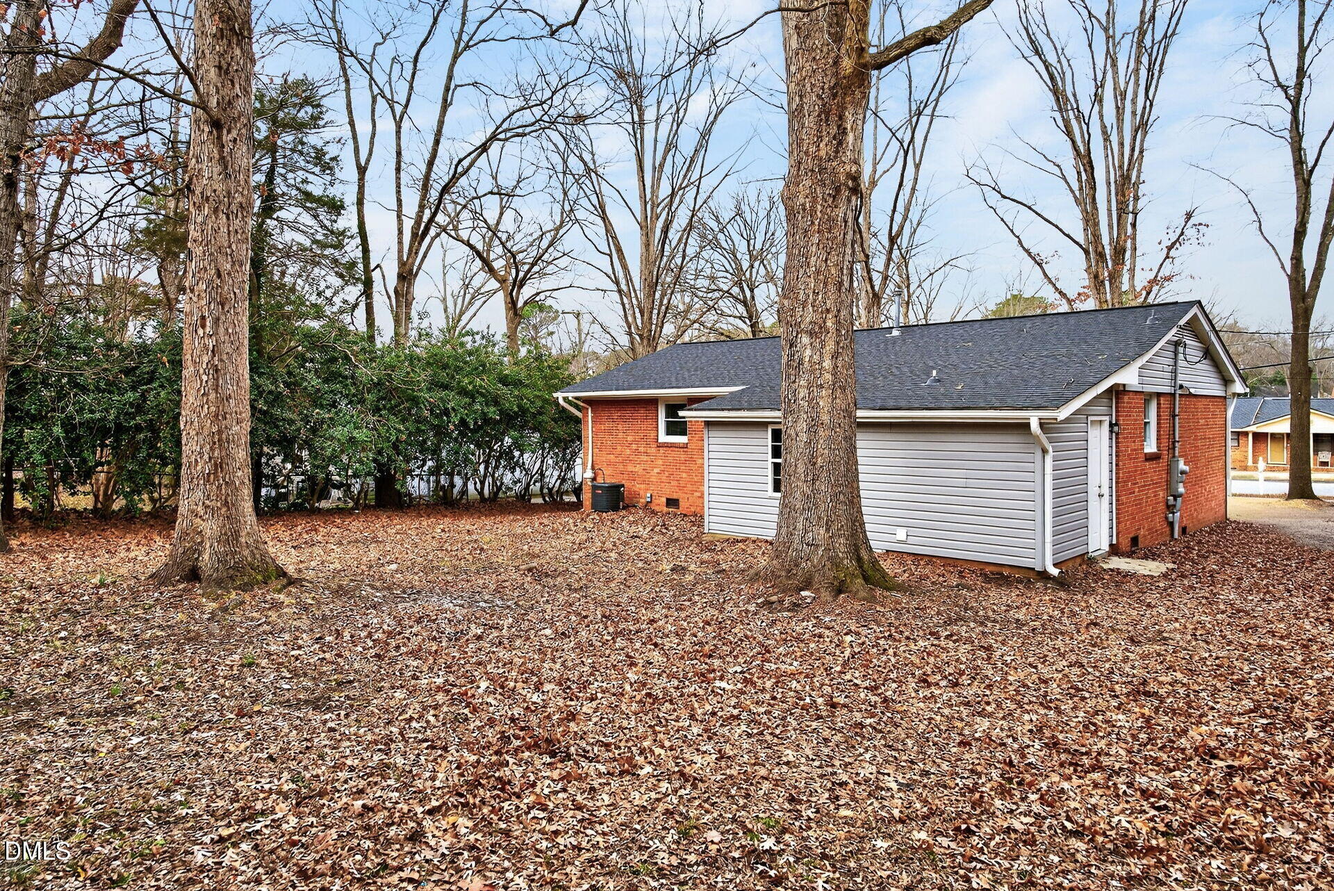 517 Cooper Road Raleigh, NC 27610 - Photo 25 of 29 a house with trees in front of it