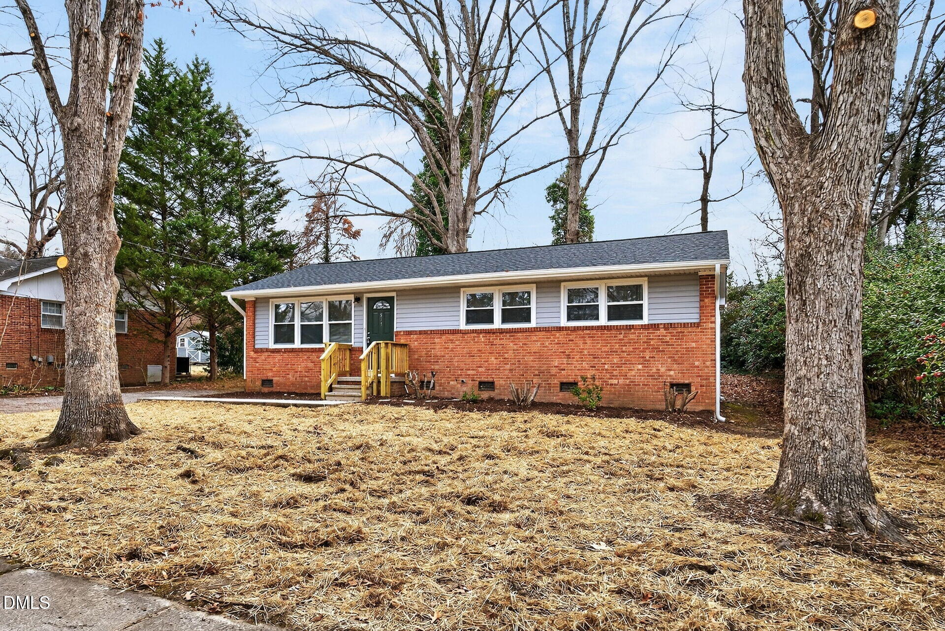 517 Cooper Road Raleigh, NC 27610 - Photo 2 of 29 a front view of a house with a yard