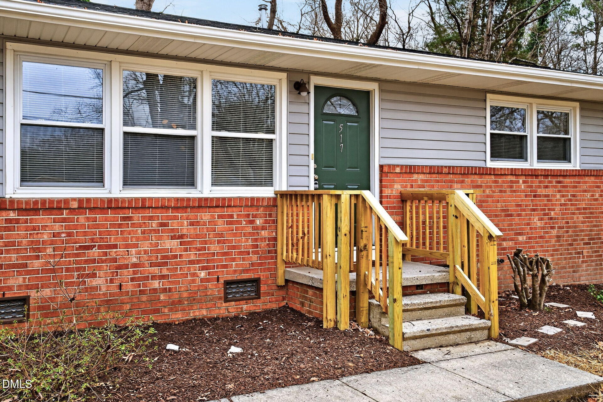 517 Cooper Road Raleigh, NC 27610 - Photo 4 of 29 a view of front door of house with stairs