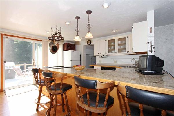160 Middle Road Southborough, MA 01772 - Photo 11 of 28 a kitchen with a dining table and chairs
