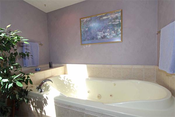 160 Middle Road Southborough, MA 01772 - Photo 18 of 28 a bathroom with a tub and shower