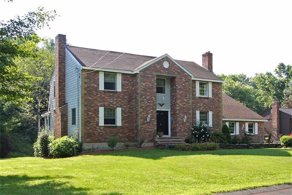 160 Middle Road Southborough, MA 01772 - Photo 2 of 28 a front view of a house with a yard