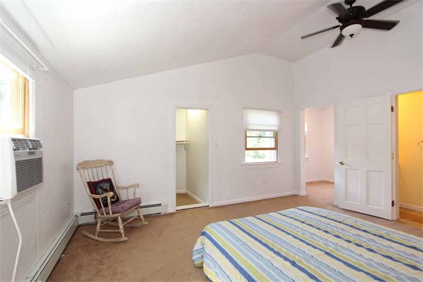 160 Middle Road Southborough, MA 01772 - Photo 23 of 28 a bedroom with a bed chair and window