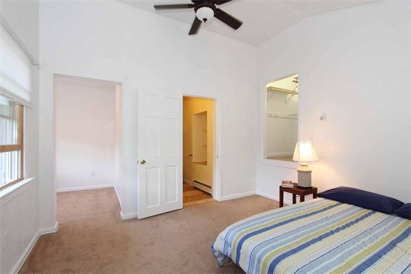 160 Middle Road Southborough, MA 01772 - Photo 24 of 28 a bedroom with a bed and a lamp