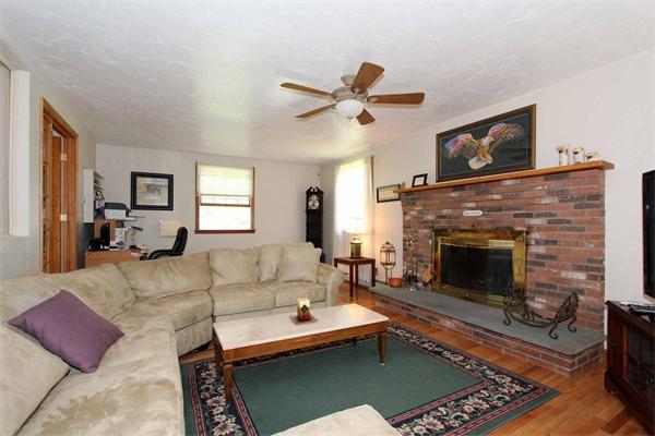 160 Middle Road Southborough, MA 01772 - Photo 5 of 28 a living room with furniture and a fireplace