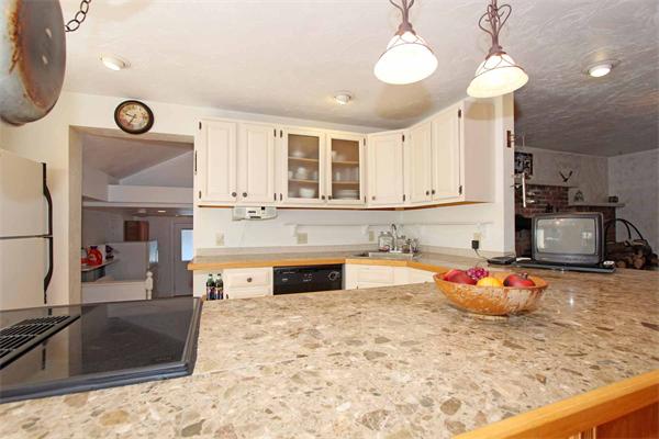 160 Middle Road Southborough, MA 01772 - Photo 10 of 28 a kitchen with stainless steel appliances granite countertop a stove oven and a sink with cabinets