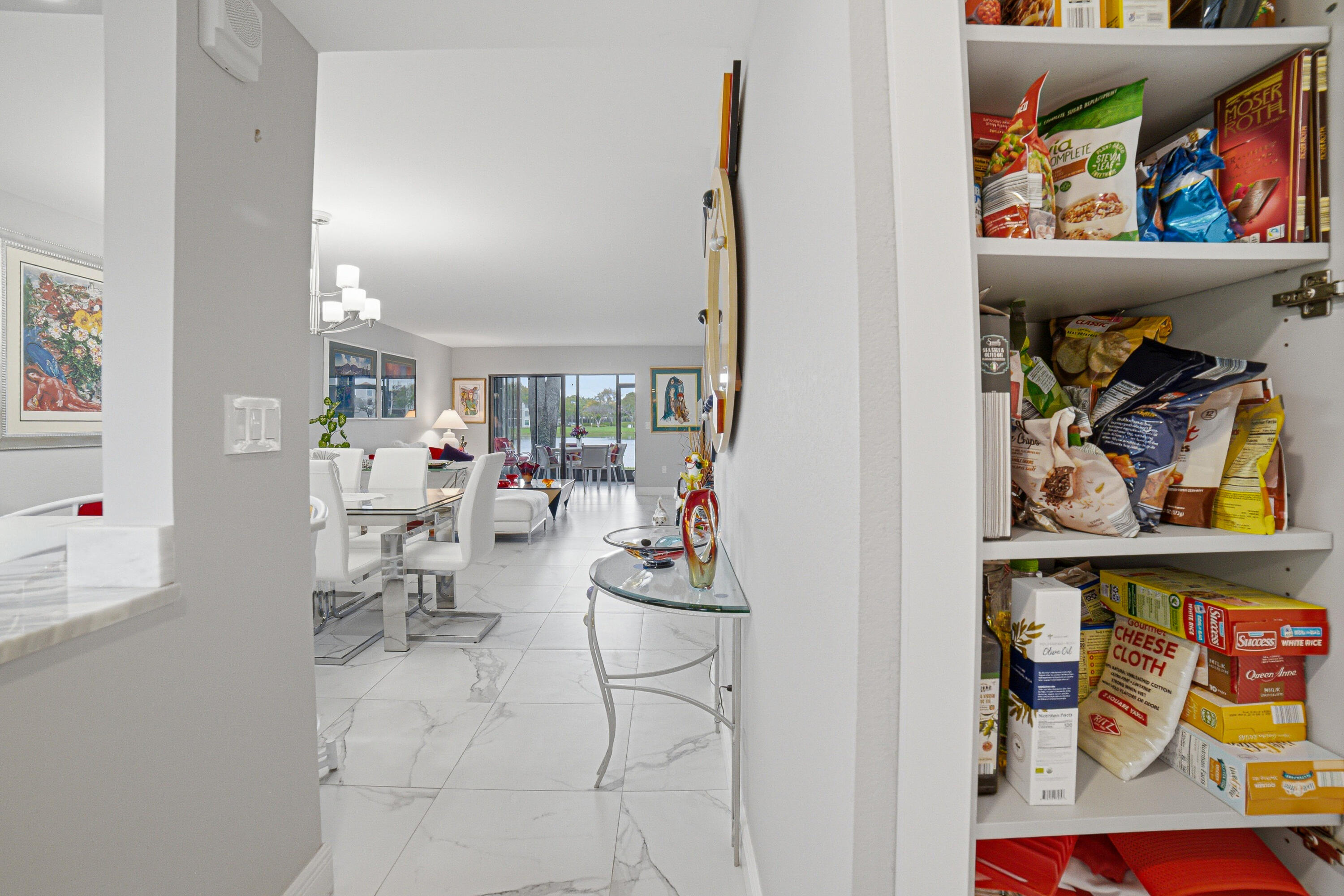 6149 Pointe Regal Circle, Unit 104 Delray Beach, FL 33484 - Photo 13 of 64 Living Area & Pantry
