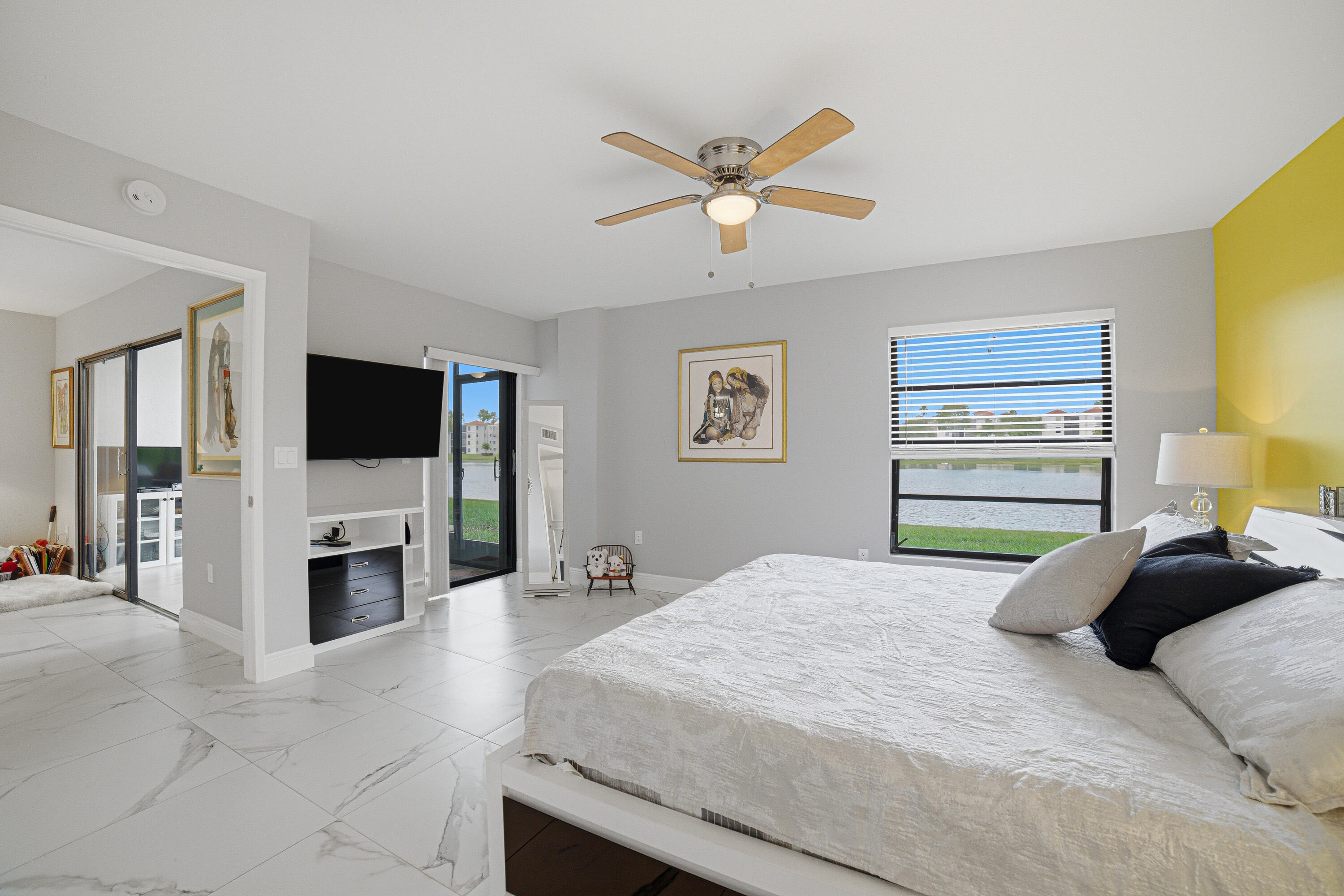 6149 Pointe Regal Circle, Unit 104 Delray Beach, FL 33484 - Photo 20 of 64 Primary Bedroom