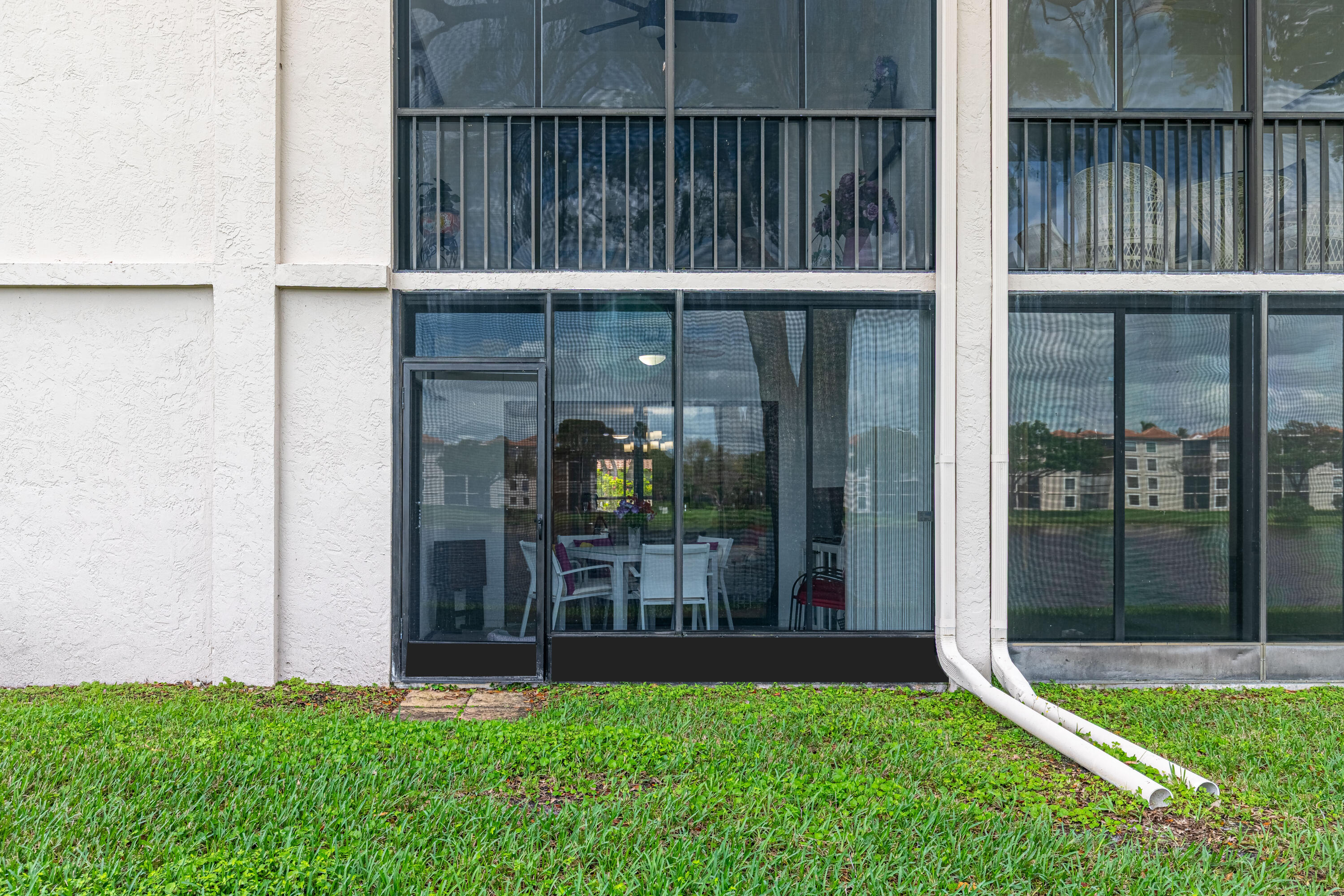 6149 Pointe Regal Circle, Unit 104 Delray Beach, FL 33484 - Photo 35 of 64 Back of Building - Patio