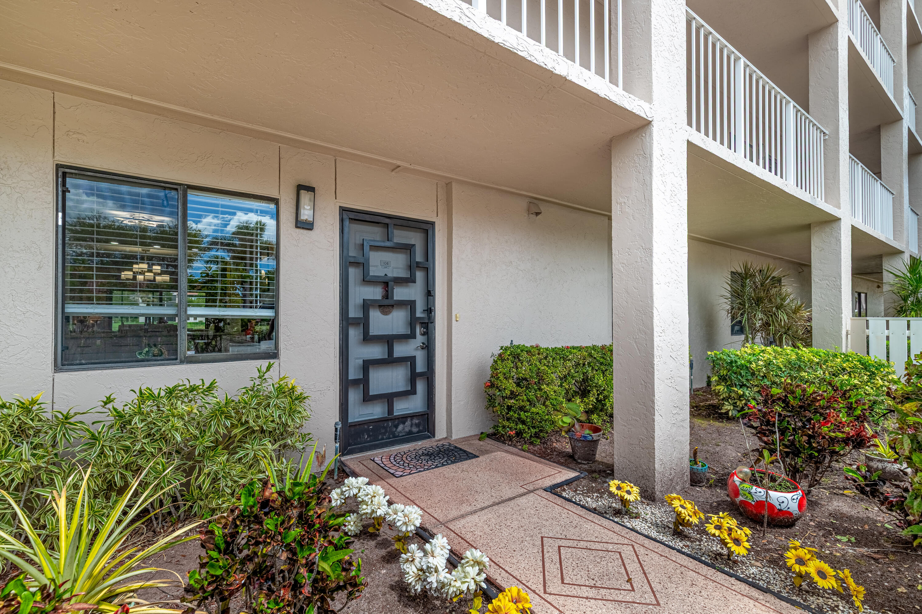 6149 Pointe Regal Circle, Unit 104 Delray Beach, FL 33484 - Photo 4 of 64 Front Door