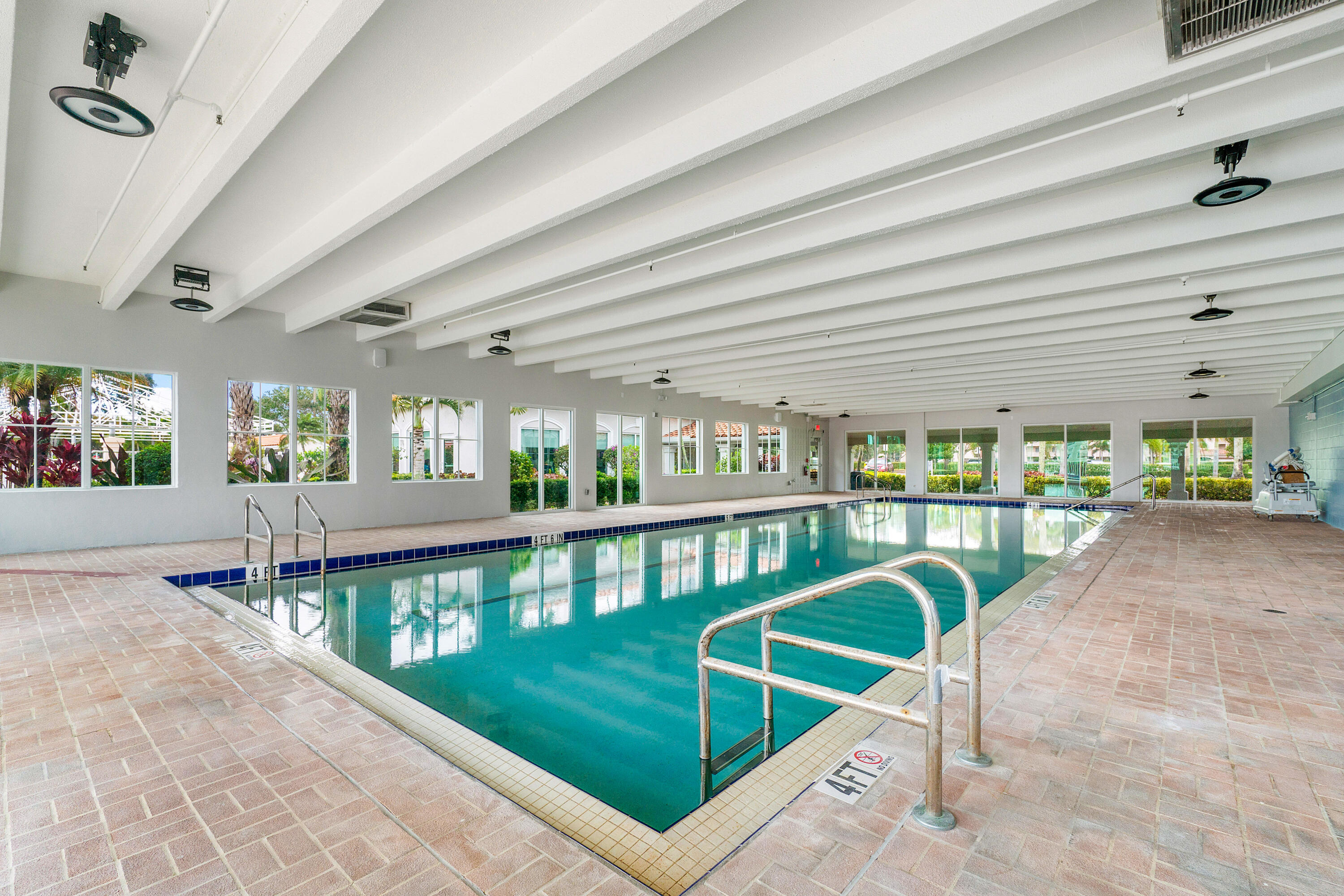 6149 Pointe Regal Circle, Unit 104 Delray Beach, FL 33484 - Photo 55 of 64 Indoor Pool