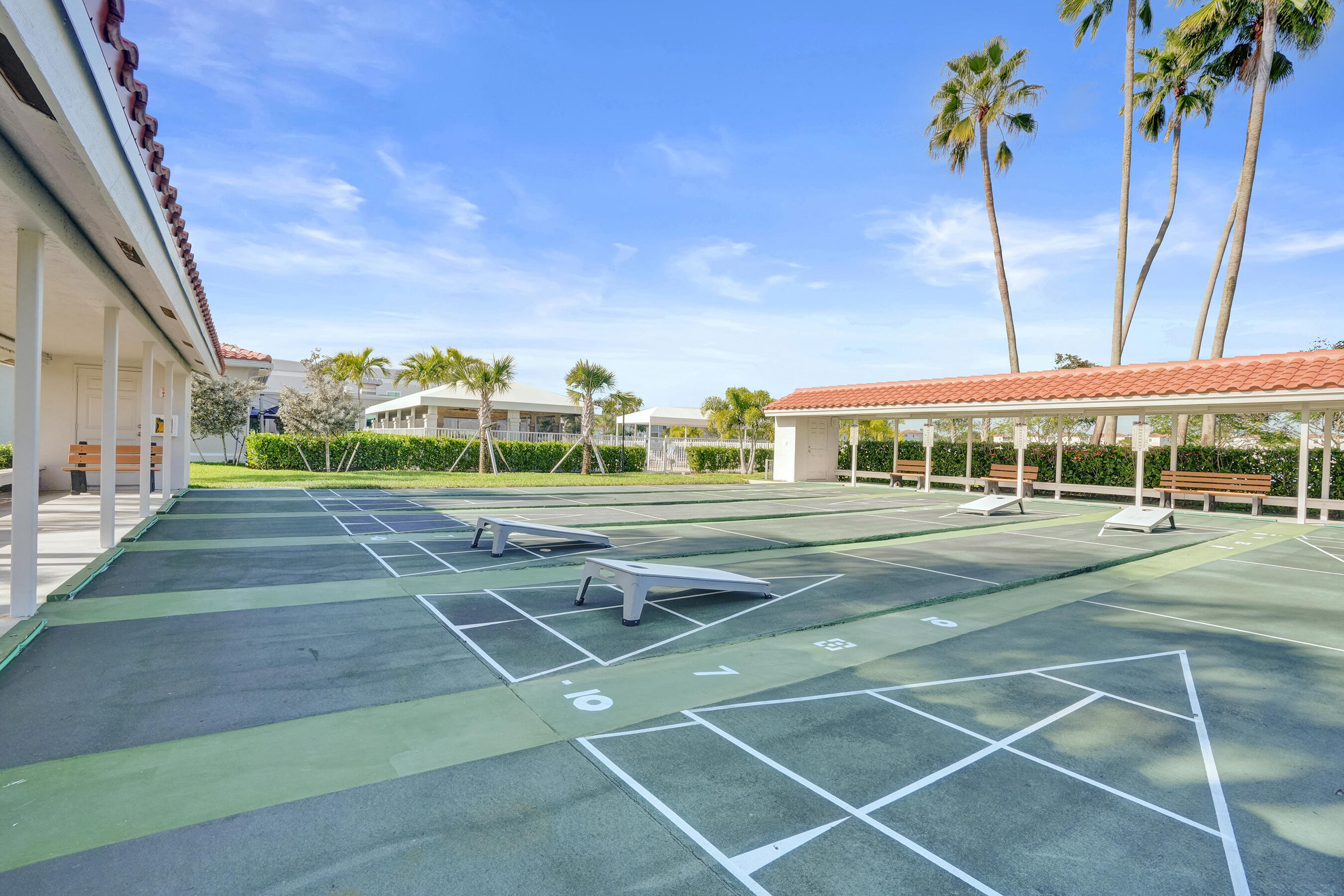 6149 Pointe Regal Circle, Unit 104 Delray Beach, FL 33484 - Photo 56 of 64 a view of a tennis court