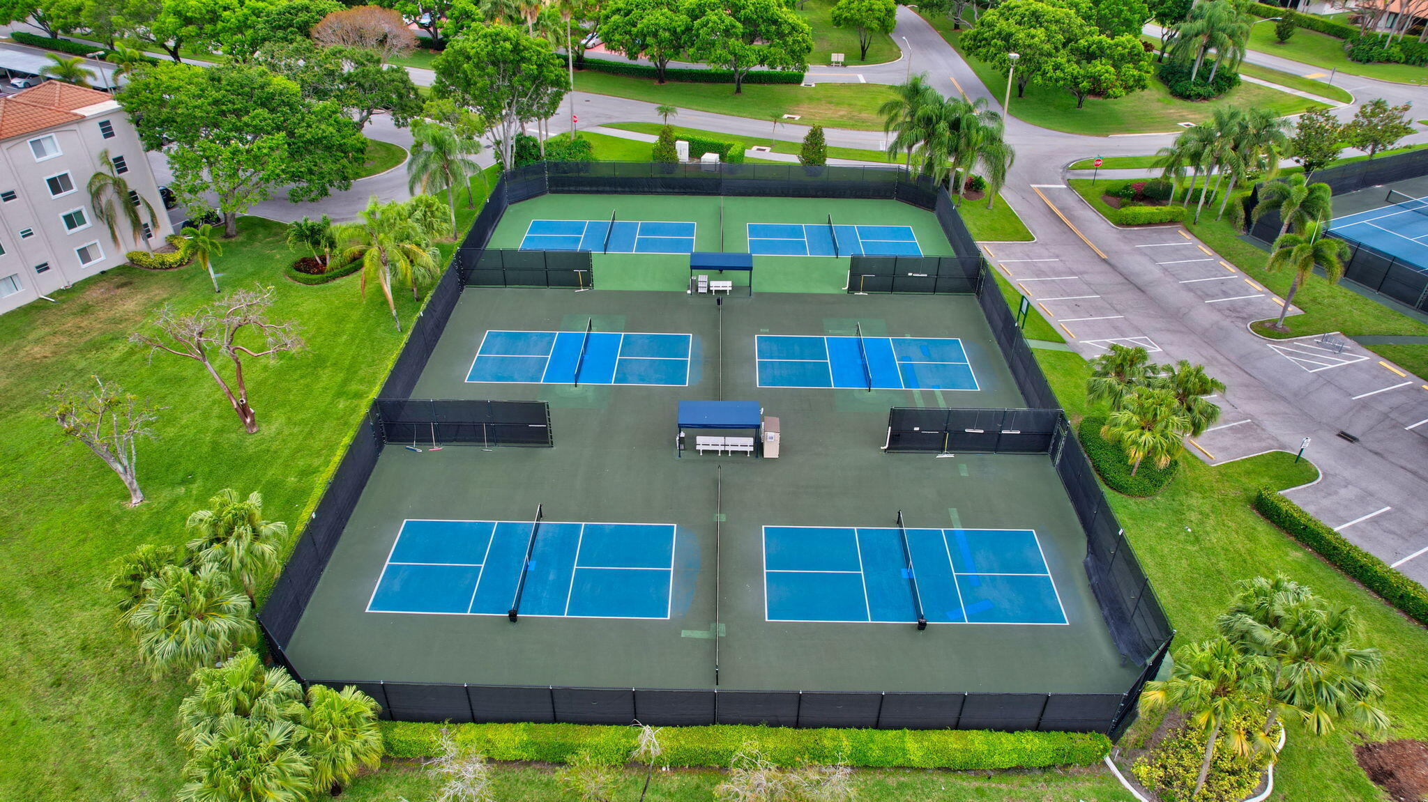 6149 Pointe Regal Circle, Unit 104 Delray Beach, FL 33484 - Photo 59 of 64 a view of swimming pool with a yard