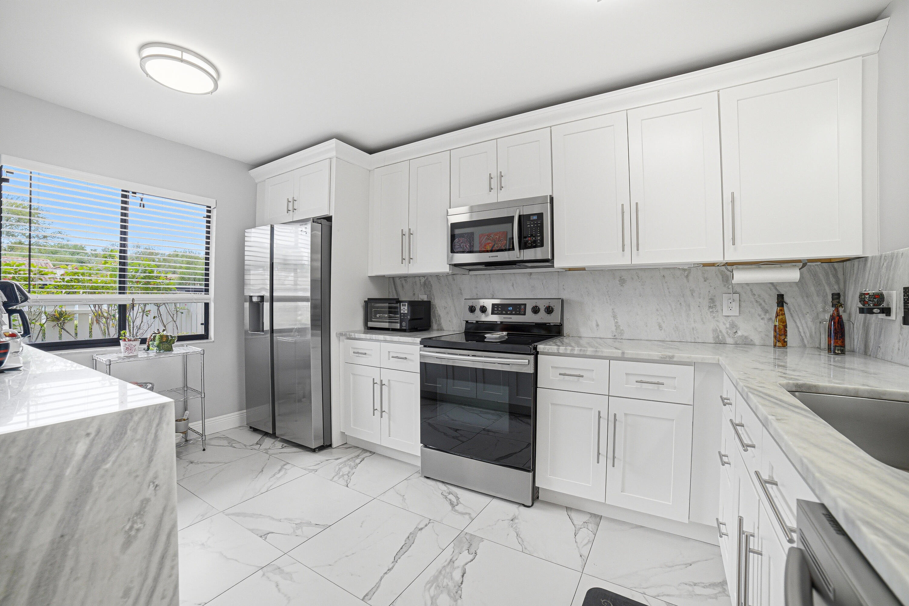 6149 Pointe Regal Circle, Unit 104 Delray Beach, FL 33484 - Photo 7 of 64 Kitchen