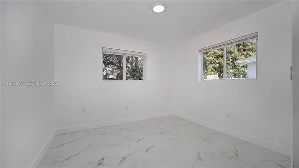 an empty room with a window