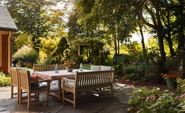 a view of yard with patio